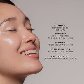 Close-up of a woman's face with skincare benefits listed on a grey background