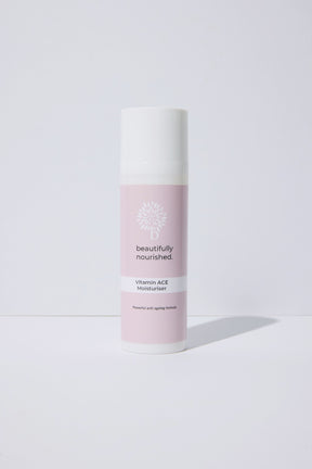 Skincare bottle labeled 'beautifully nourished' on a white background featuring moisturiser to protect and rejuvenate the skin