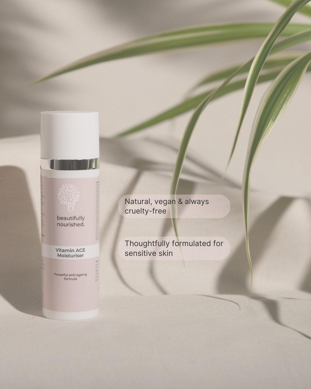 vegan friendly Skincare bottle with plant on a neutral background